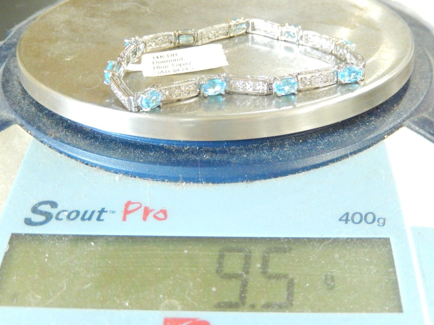 14K Approximate 4.00 CT TW Oval Blue Stone and Diamond Bracelet 7" 9.5gms
