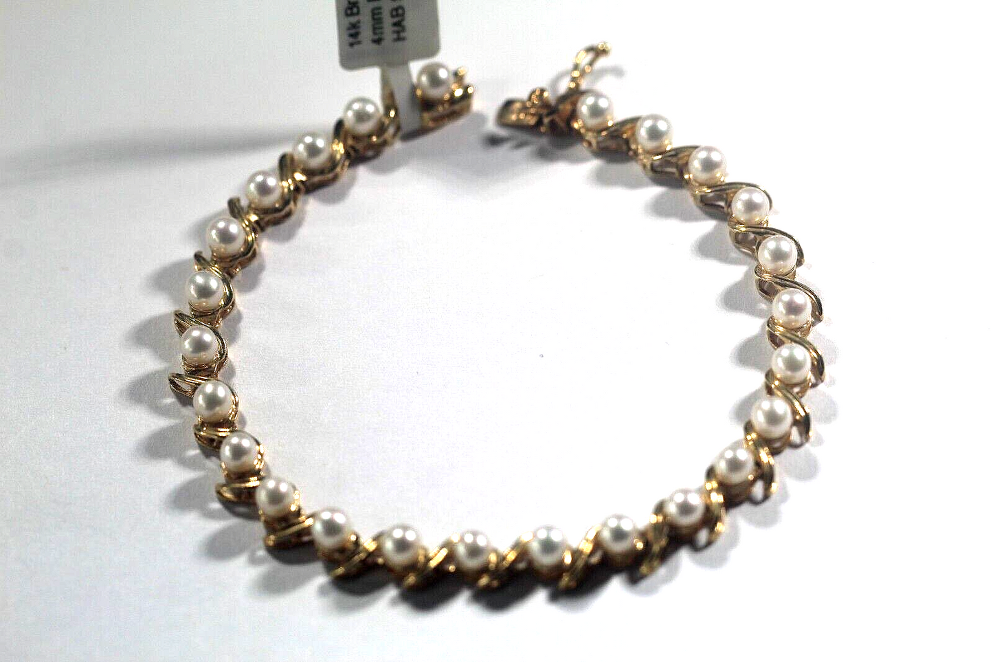 Stamped 14k Gold Link Bracelet with 25 - 4 mm Pearls 7" Length - 9.7 gms