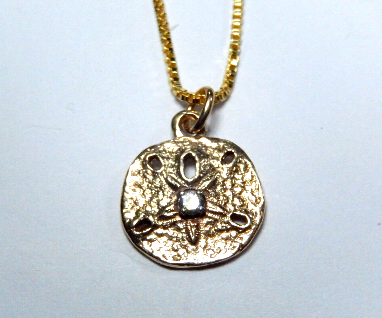 14K Yellow Gold Single Diamond 13mm Sand Dollar Pendant with 18 Chain