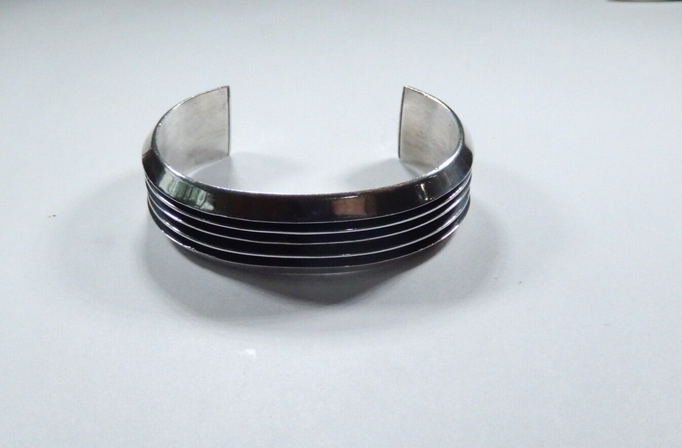 Handcrafted Tom Hawk Navajo Four Channel “RAIL” Sterling Silver Cuff Bracelet