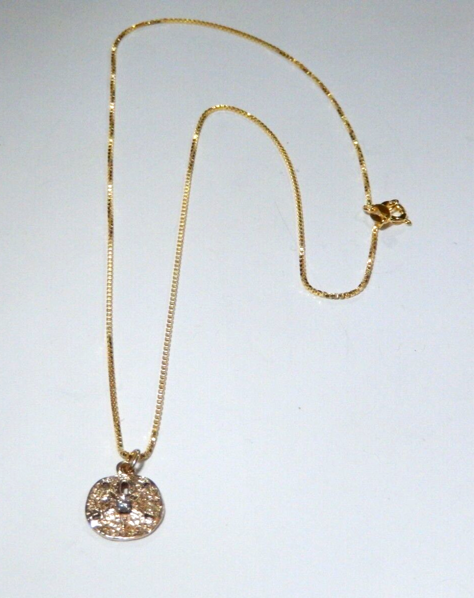 14K Yellow Gold Single Diamond 13mm Sand Dollar Pendant with 18 Chain