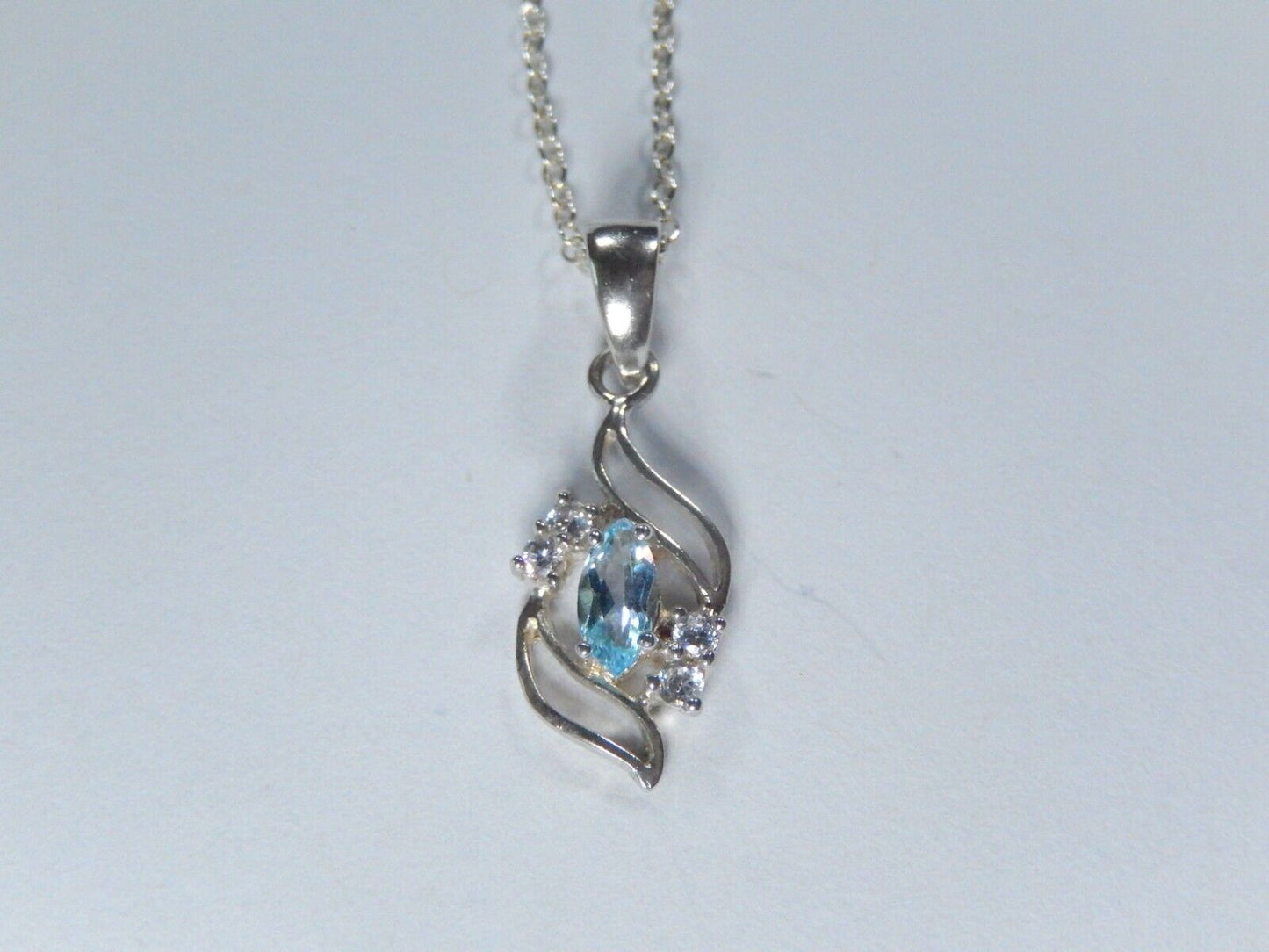 Sterling Silver Blue Topaz and CZ Pendant Necklace 18"