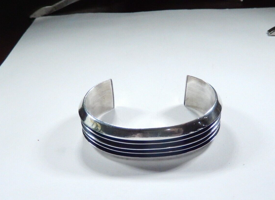 Handcrafted Tom Hawk Navajo Four Channel “RAIL” Sterling Silver Cuff Bracelet