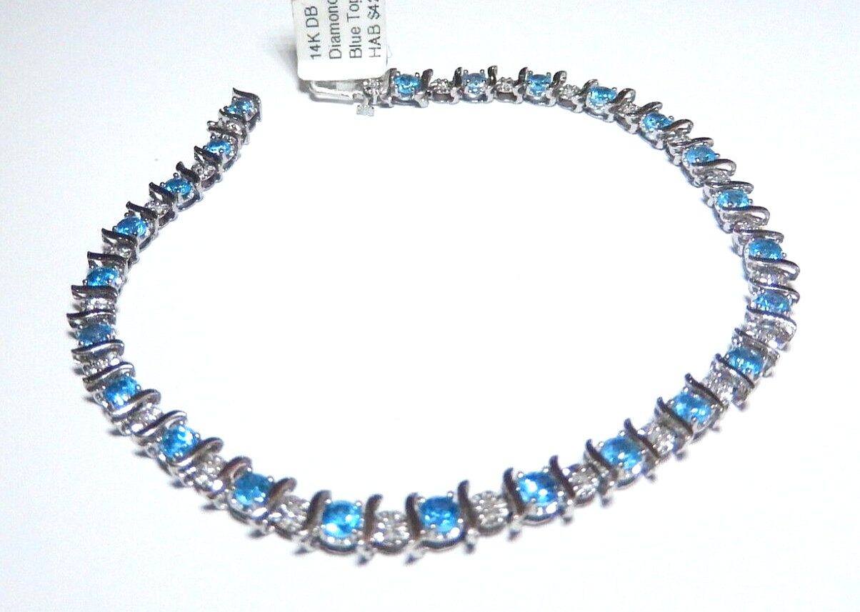 Stamped 14K White Gold 24 Blue Topaz and 24 Diamond Bracelet 7.5" approx. 7.7gms