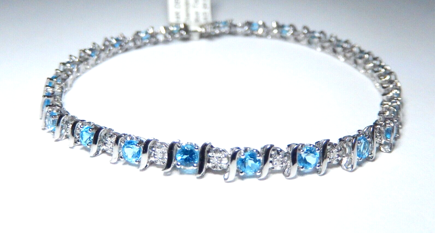 Stamped 14K White Gold 24 Blue Topaz and 24 Diamond Bracelet 7.5" approx. 7.7gms