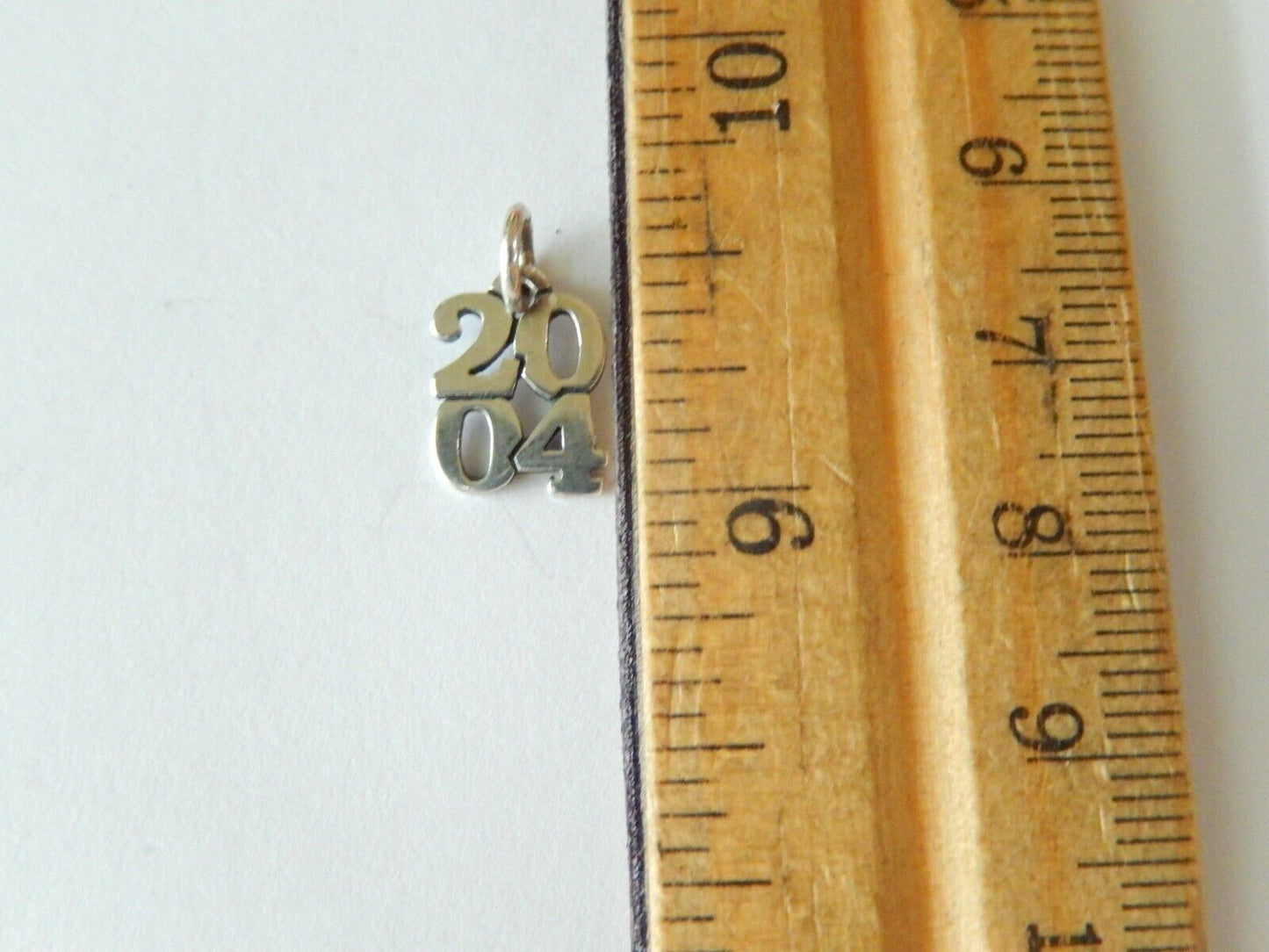 RETIRED  JAMES AVERY Sterling Silver Year 2004 Charm