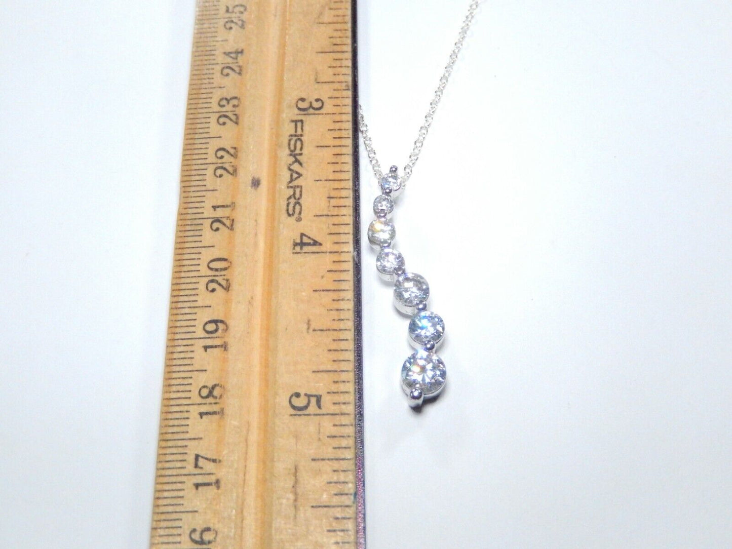 Sterling Silver Journey 2.50 CT Graduated 7 CZ Pendant  w/18" Sterling Chain