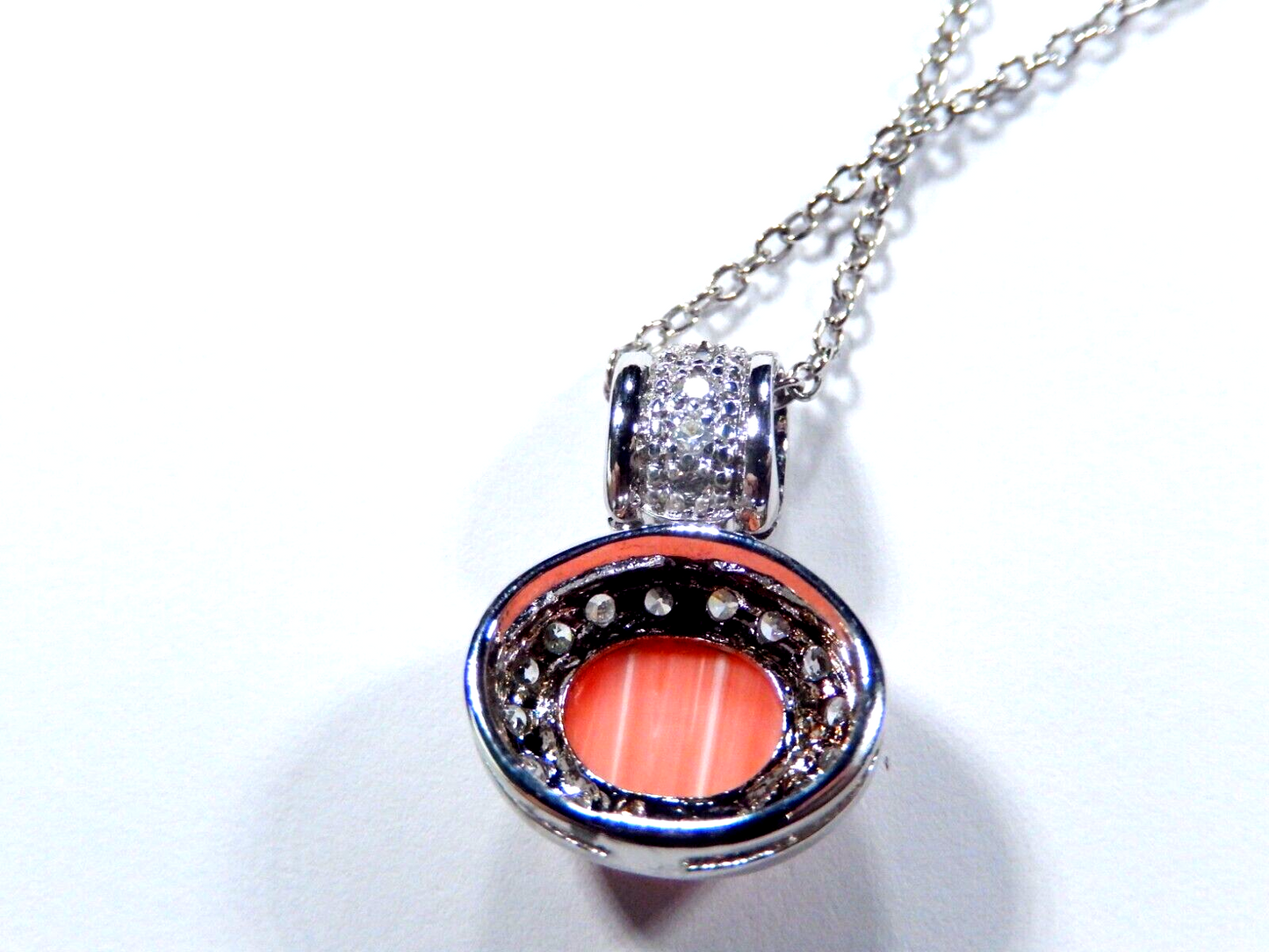 925 Sterling Silver Oval 8x10mm Pink Coral with 23 CZ's Halo Pendant & 18" Chain