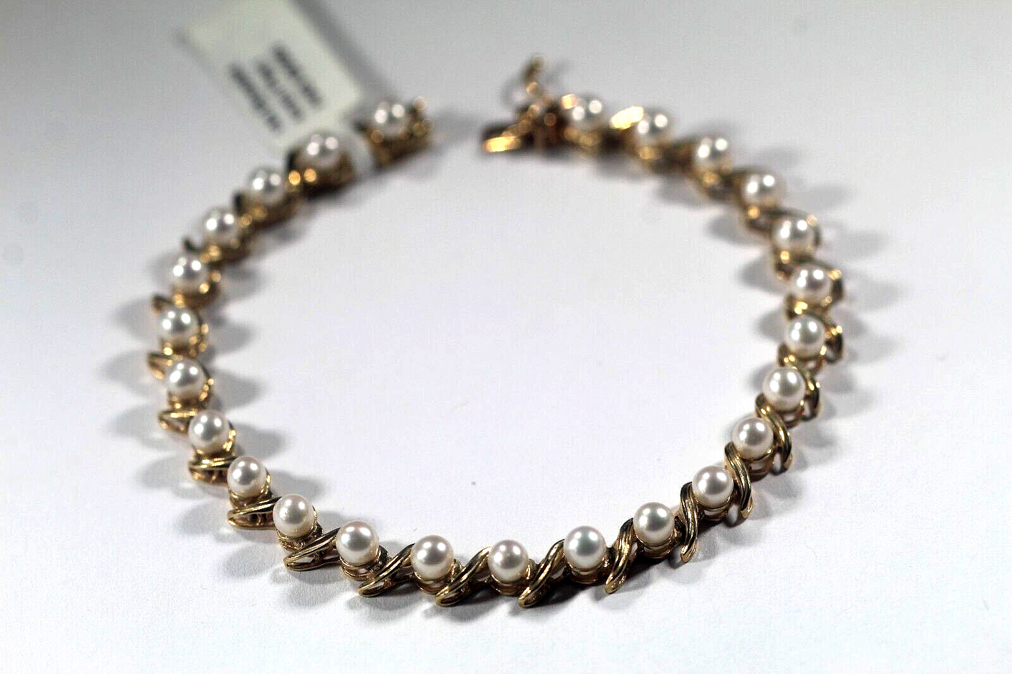 Stamped 14k Gold Link Bracelet with 25 - 4 mm Pearls 7" Length - 9.7 gms