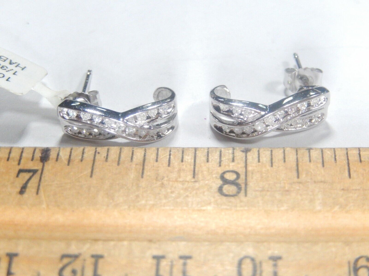 10kt White Gold Womens Round 1/3 CT Natural Diamond Infinity Earrings