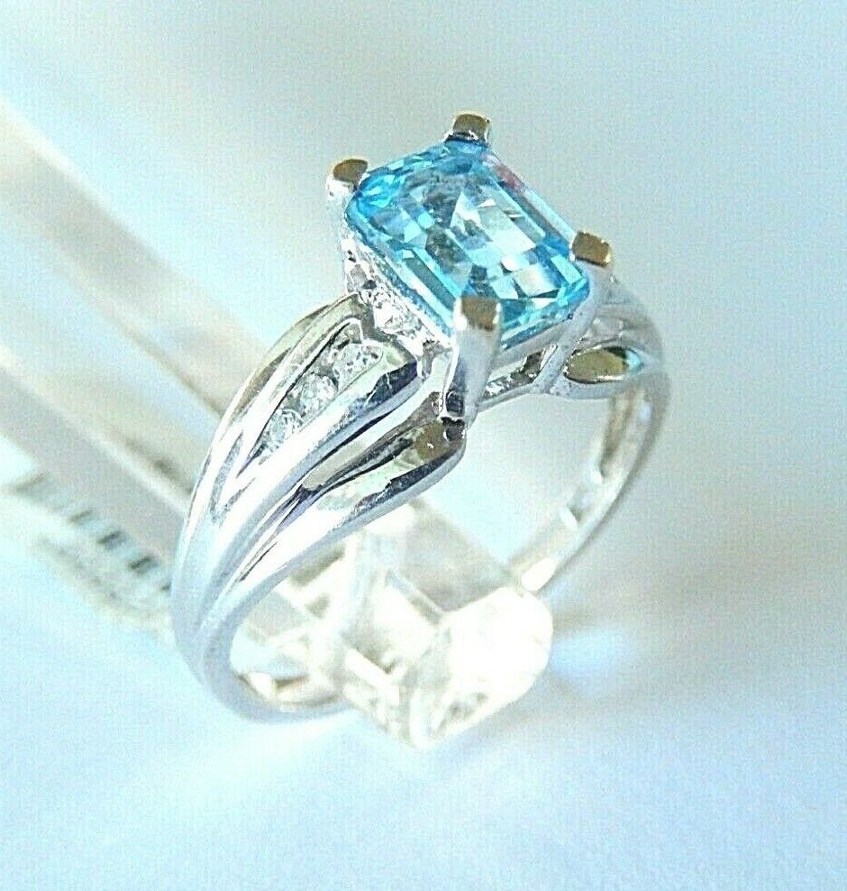 *NWT* 10k White Gold Emerald Cut 1.00 CT Blue Topaz And Six Diamond Ring Sz 7.25