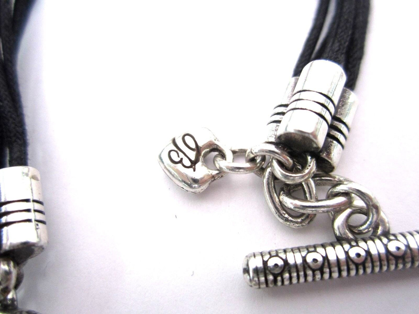 RETIRED Brighton Silver And Black Hearts Bracelet on Six Cords Bracelet Toggle