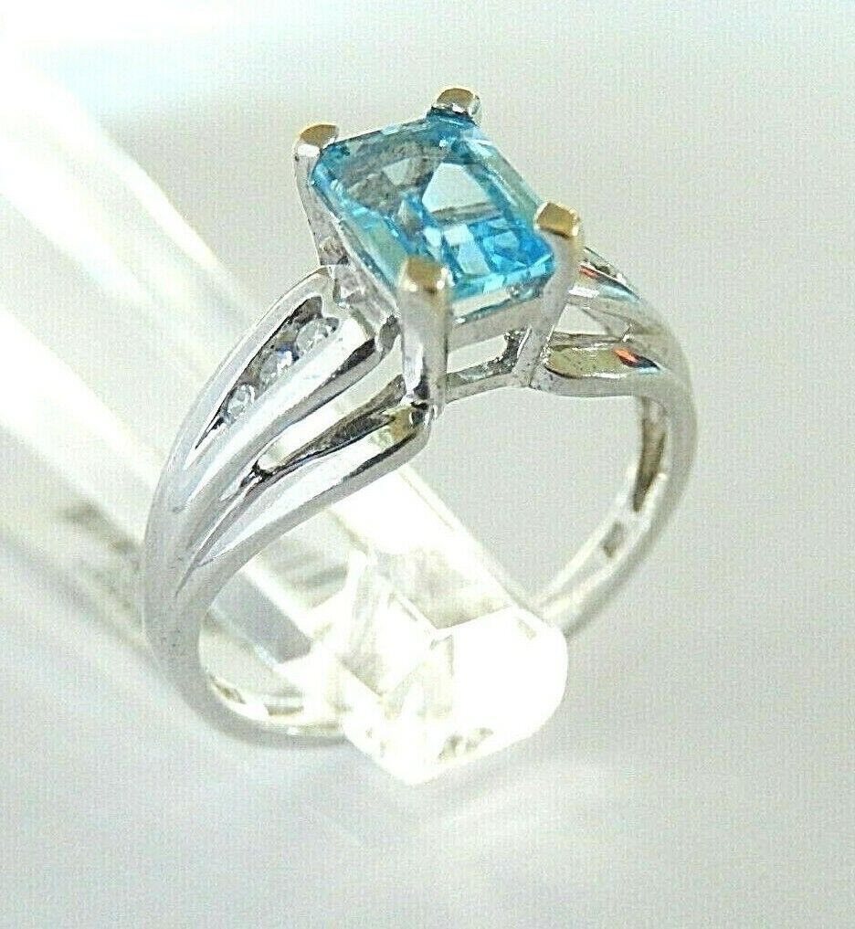 *NWT* 10k White Gold Emerald Cut 1.00 CT Blue Topaz And Six Diamond Ring Sz 7.25