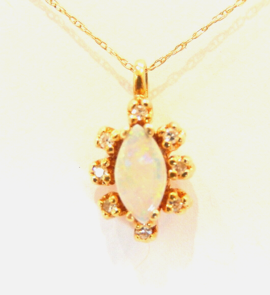 10k Yellow Gold Marquise Opal And 8 Diamond Pendant with 18" 10K Chain