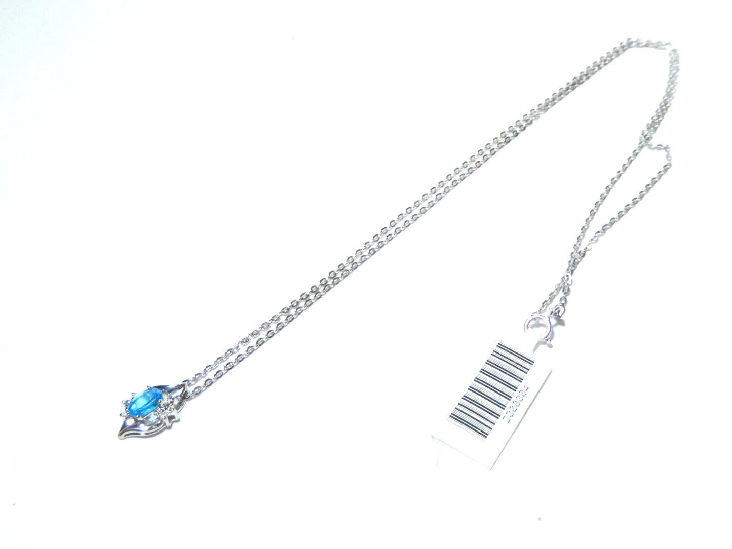 10k White Gold Oval Blue Topaz And Diamond Pendant with 18" Chain