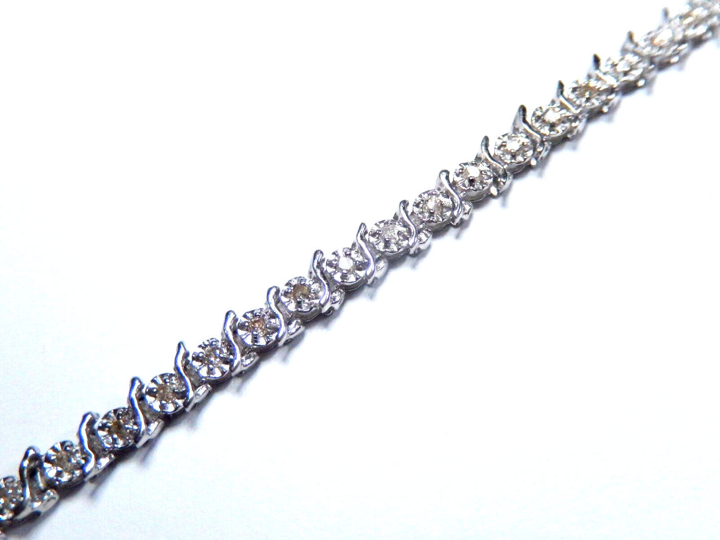 Stamped  14K White Gold "S" Link  7" Approx. 1/2CT Diamond Tennis Bracelet