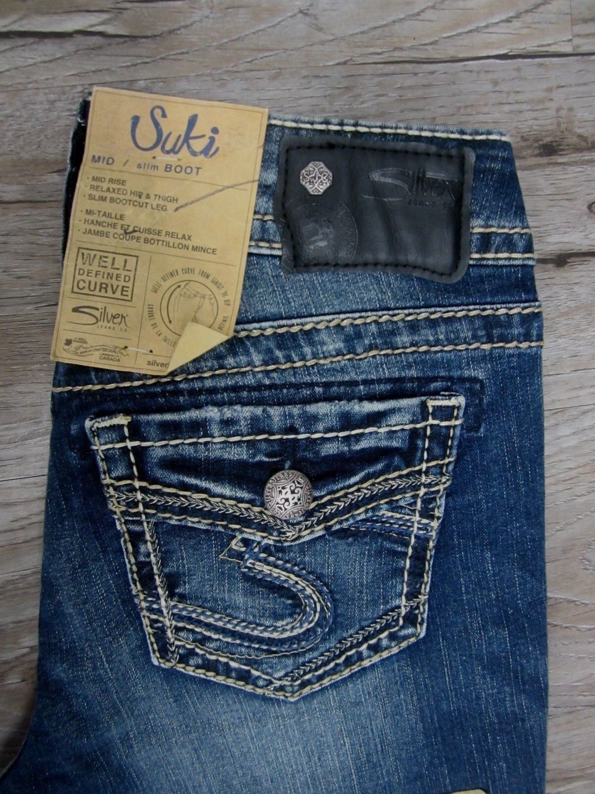 NWT SILVER Suki Mid Rise Slim Boot Medium Dark Wash Fluid Denim Jeans 25 x 33