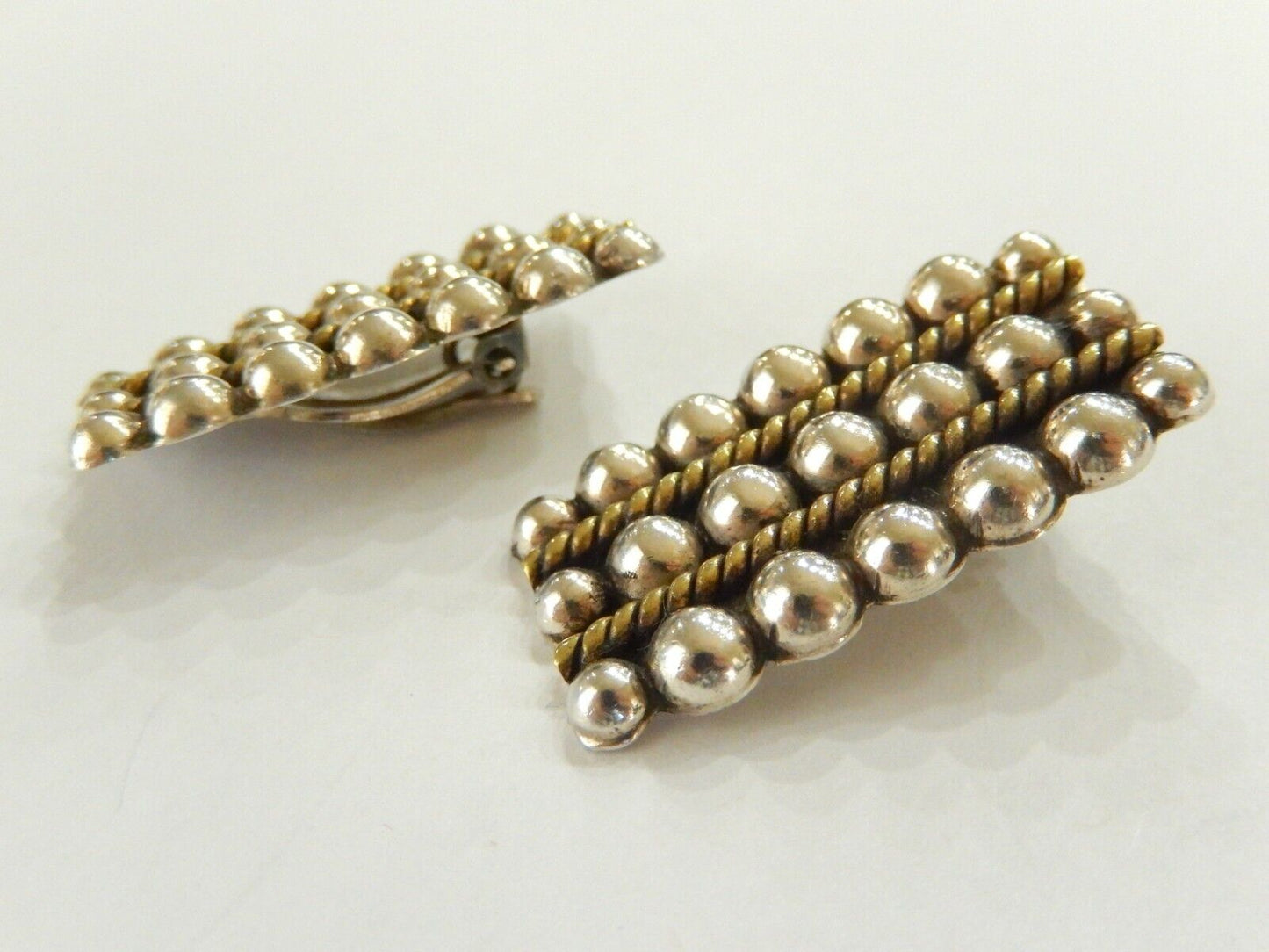 *VINTAGE* Taxco Mexico Sterling Silver and Brass Clip on Earrings 1 3/8" x 3/4"