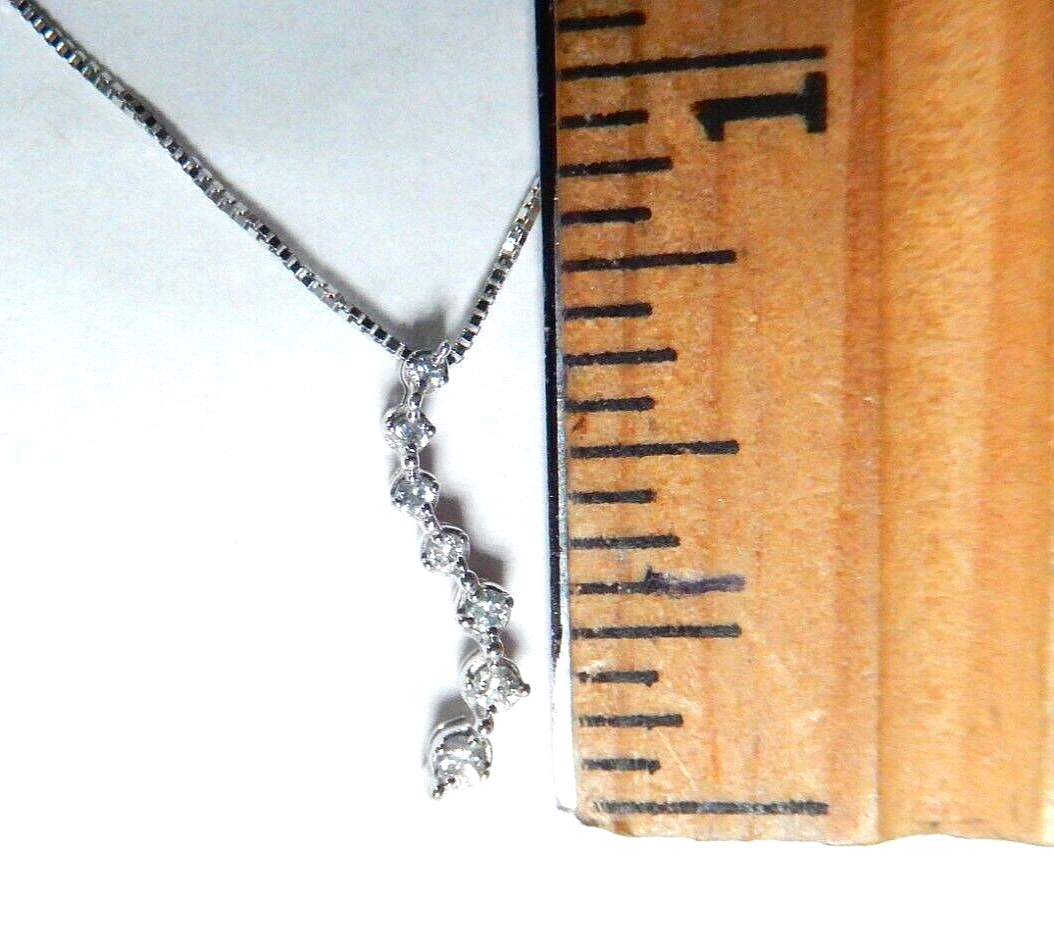 10k White Gold 1/10 Carat 7 Diamond Journey Pendant w/18" Chain