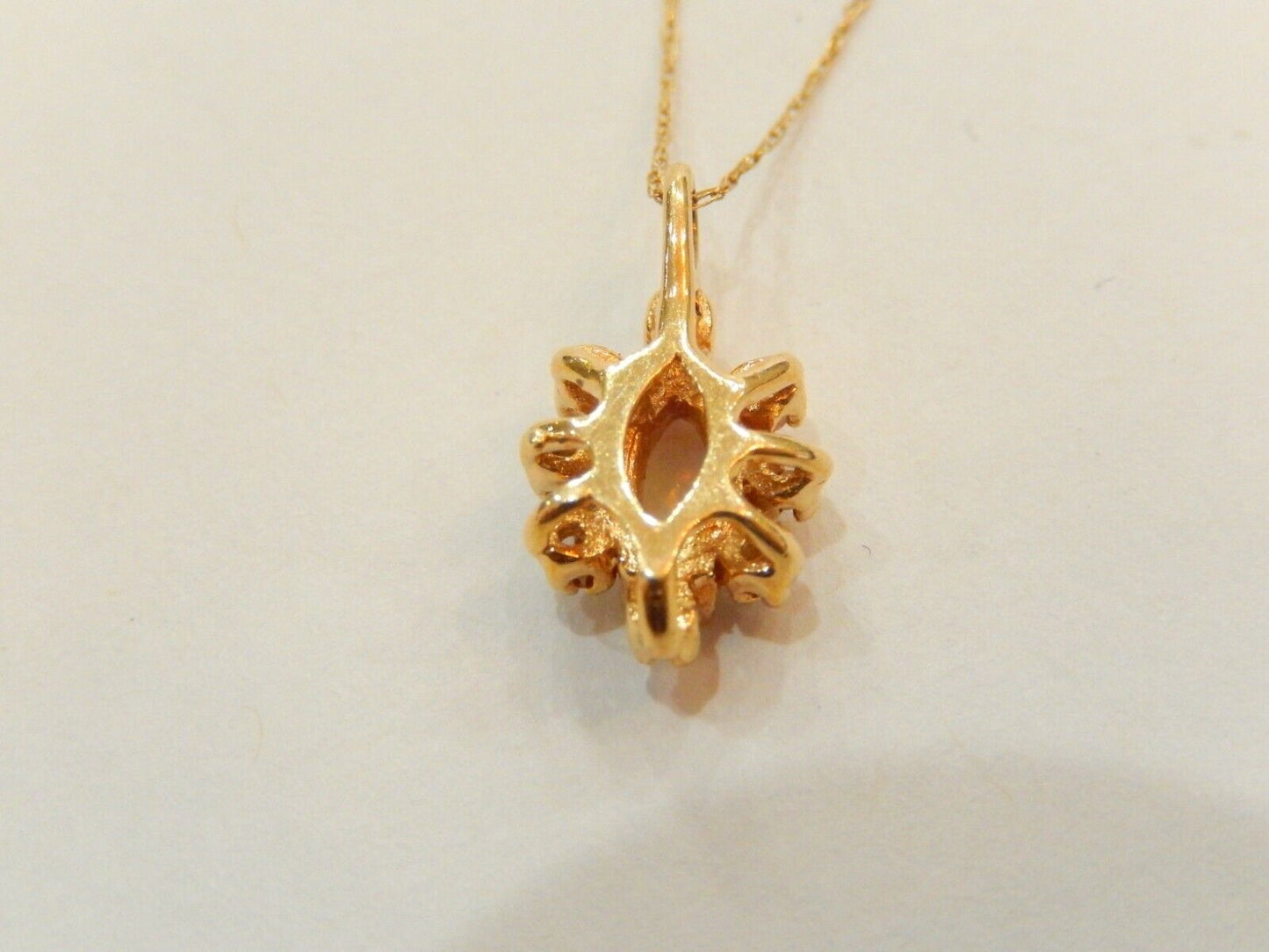 10k Yellow Gold Marquise Opal And 8 Diamond Pendant with 18" 10K Chain