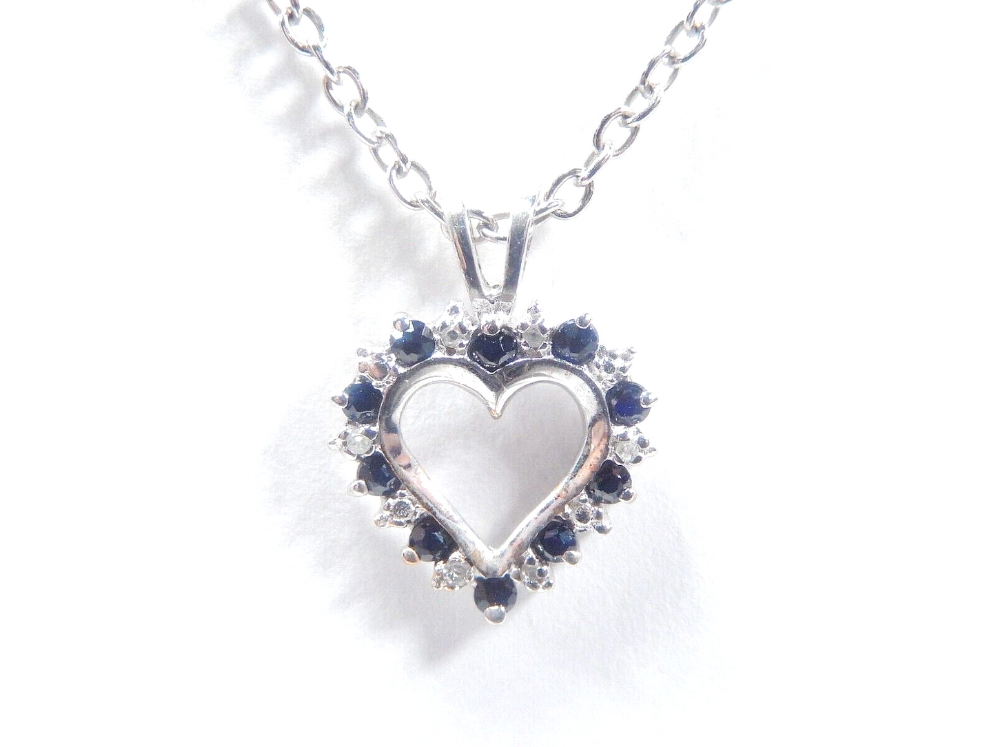 10k White Gold Round Sapphire And Diamond Heart Pendant with 18" Chain