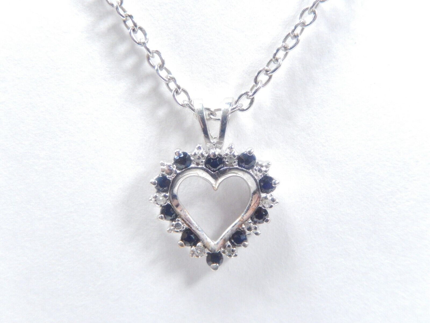 10k White Gold Round Sapphire And Diamond Heart Pendant with 18" Chain