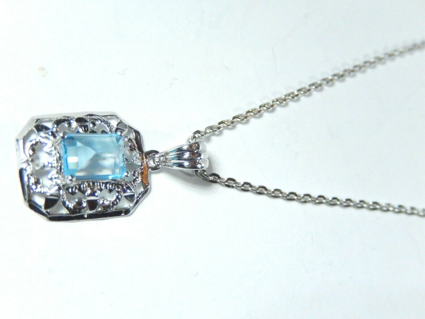 *NWT*  10k White Gold Genuine Blue Topaz and Diamond  Pendant Necklace w/18" Chn