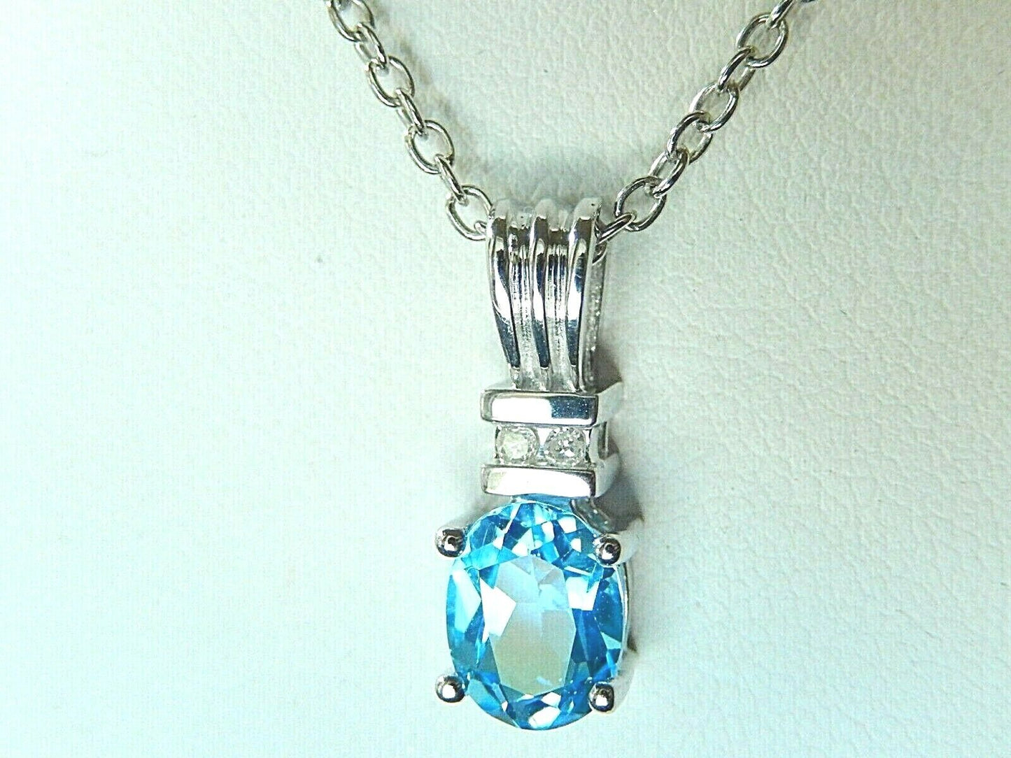 *NWT* 14K White Gold Genuine 1.25CT London Blue Topaz and Diamond Oval Pendant