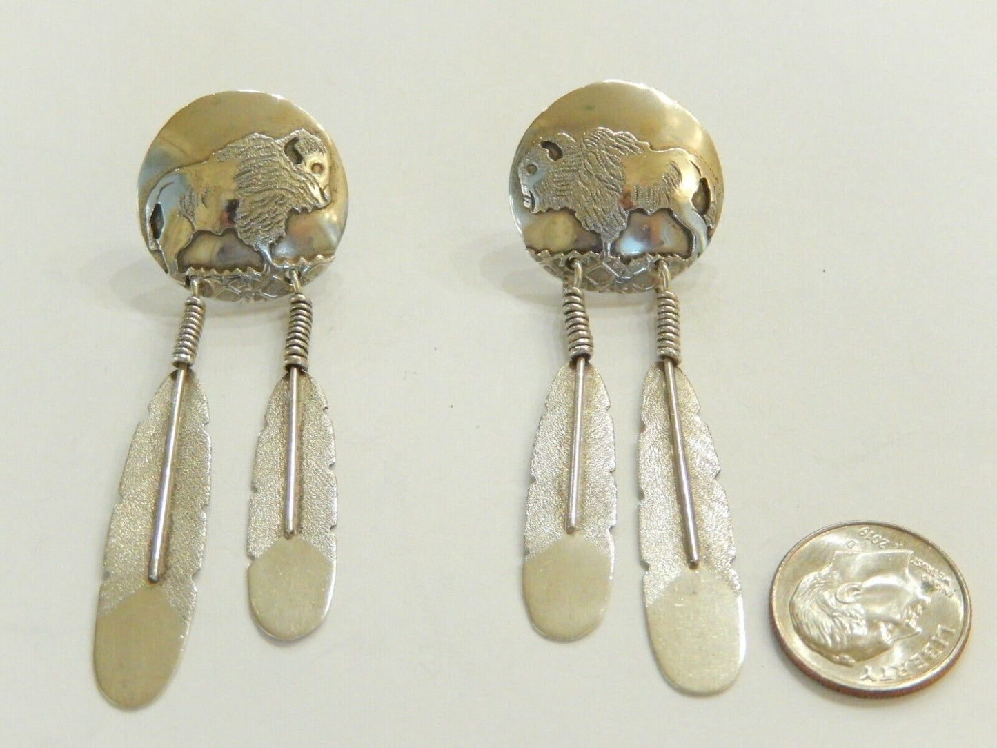 *VINTAGE*  J C Delgarito Navajo Sterling Silver Buffalo Concho Feather Earrings