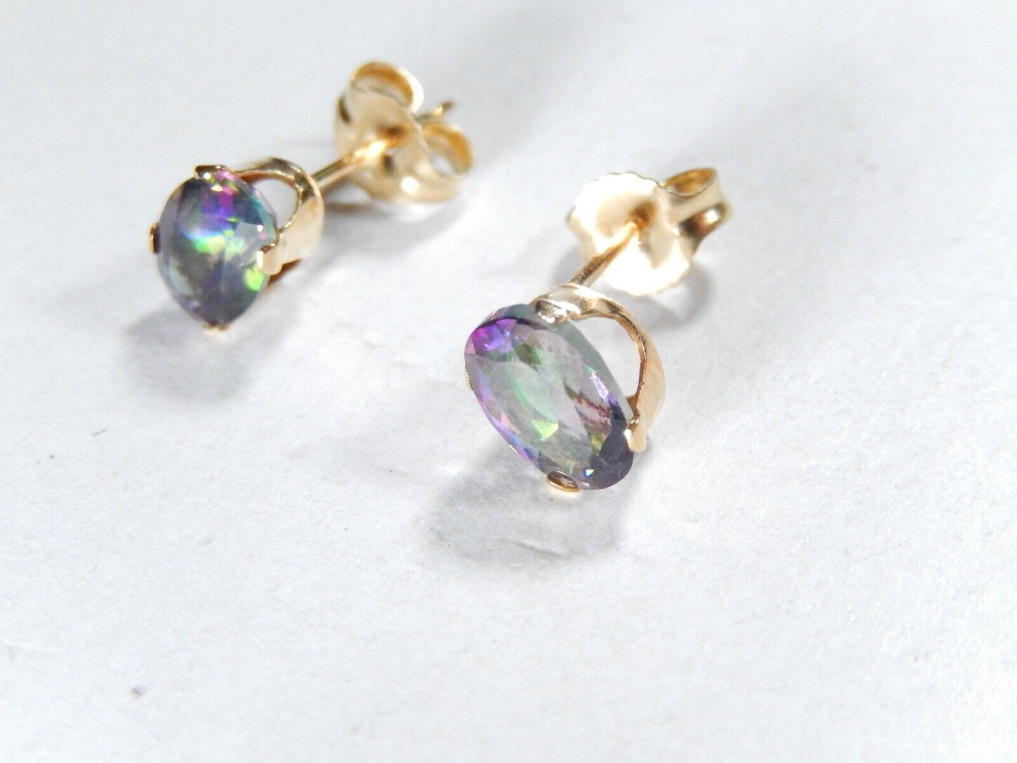 14k Yellow Gold 1.50CT TW  Oval Mystic Topaz 7mm x 5mm Post Earrings