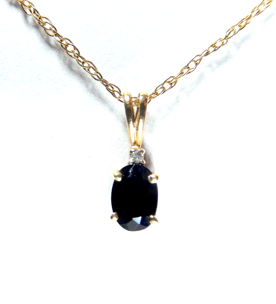 10k Yellow Gold .50 CT Oval Sapphire And Diamond Pendant with 18" YG Chain