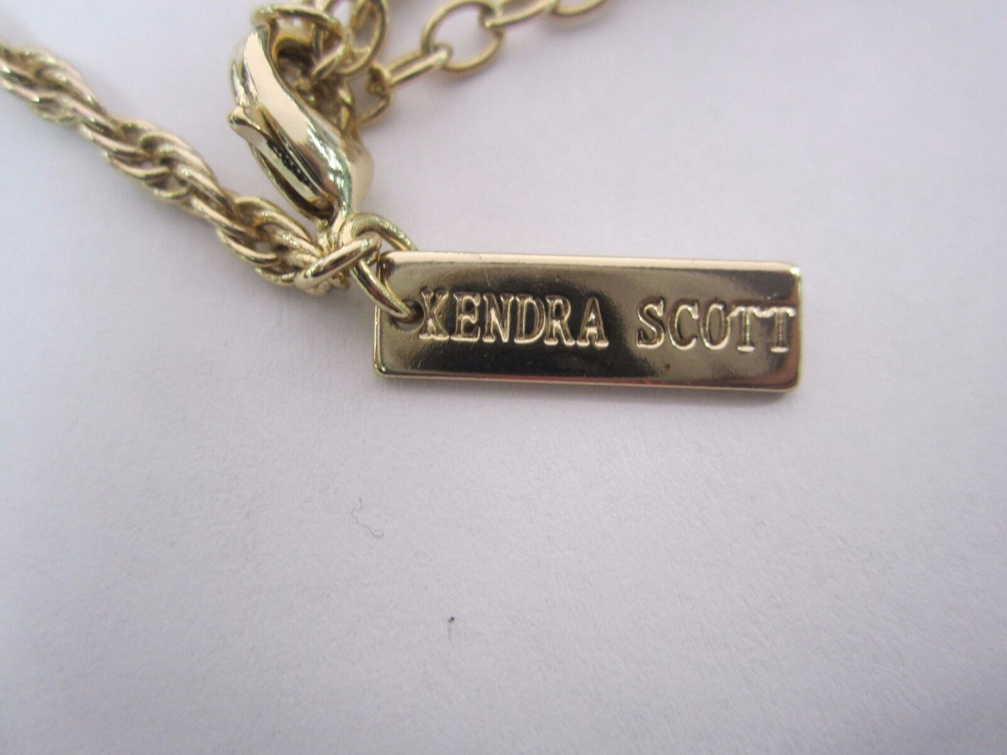 Kendra Scott Rose Quartz Necklace in Yellow Gold Tone Finish