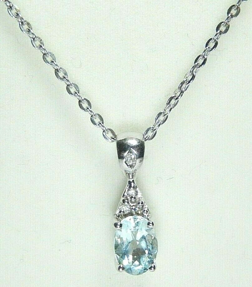 *NWT*  10k White Gold Diamond and Aquamarine .75CT Oval Shaped Pendant Necklace