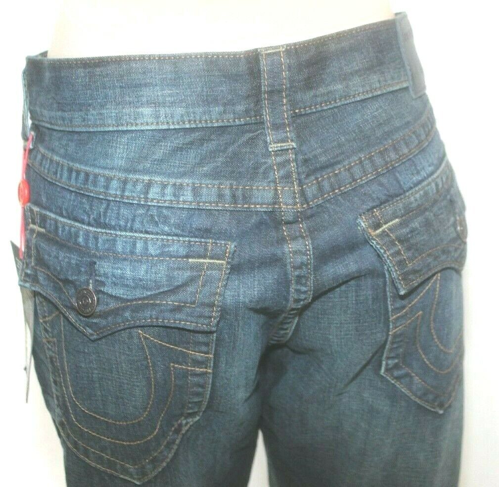 * NWT* $189.  TRUE RELIGION GENO SLIM RELAXED WITH FLAP JEANS SIZE W34 x L33