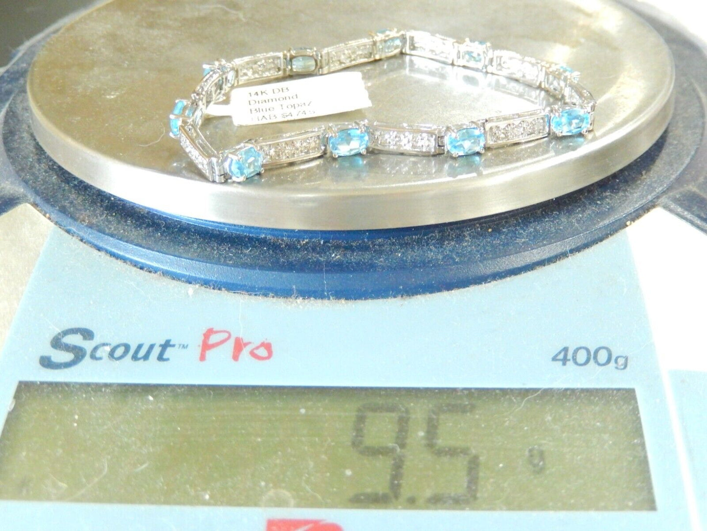 14K Approximate 4.00 CT TW  Oval Blue Stone and Diamond Bracelet 7"   9.5gms