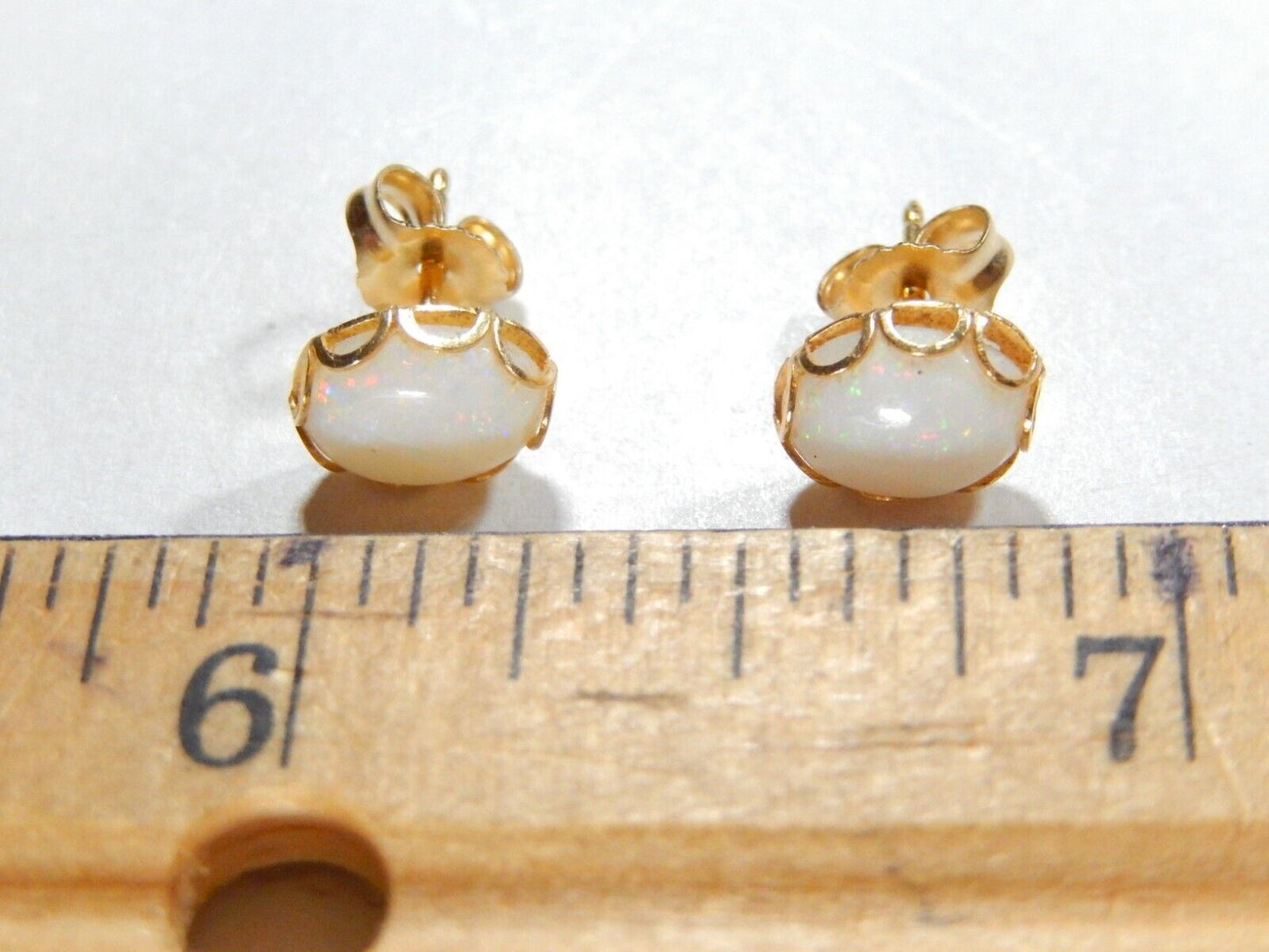 14K Yellow Gold 8mm x 6mm 2.00 CT TW Oval Shape Opal Stud Earrings