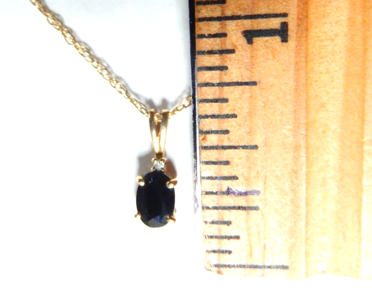 10k Yellow Gold .50 CT Oval Sapphire And Diamond Pendant with 18" YG Chain