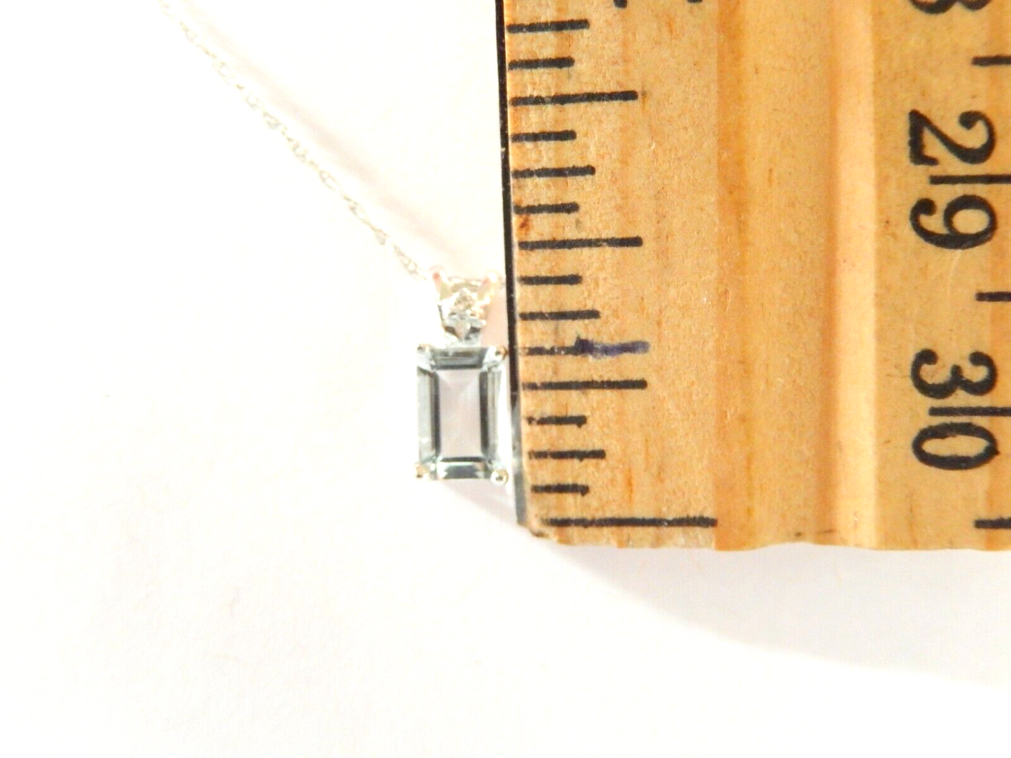 10k White Gold Diamond and .75CT Aquamarine Emerald Shaped Pendant w/17" Chain