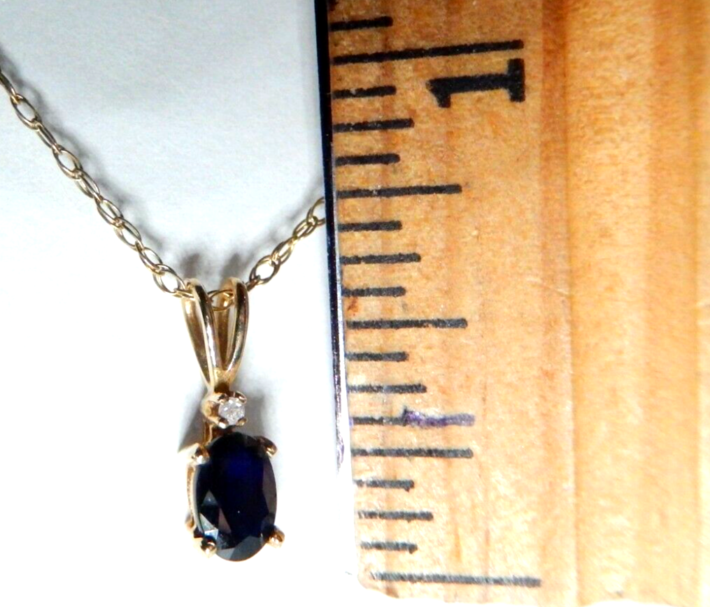 10k Yellow Gold Oval Sapphire And Diamond Pendant with 18" Chain