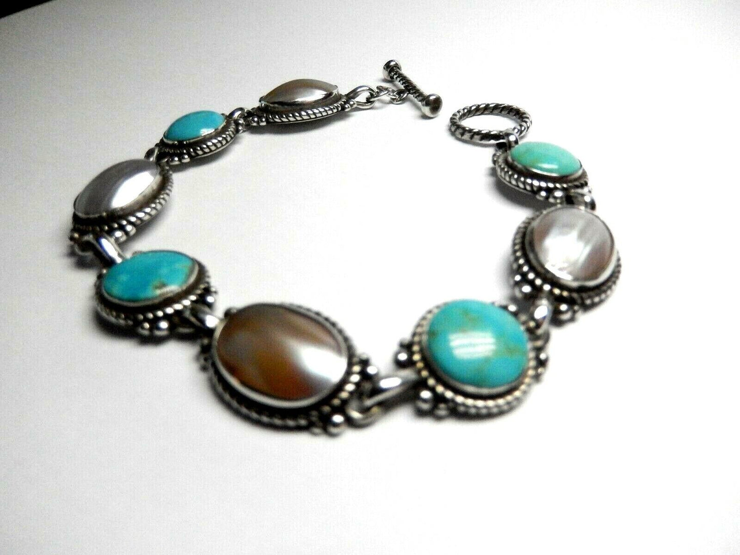 *RETIRED* CAROLYN RELIOS POLLACK STERLING TURQUOISE/MOP PURITY PROMISE BRACELET!