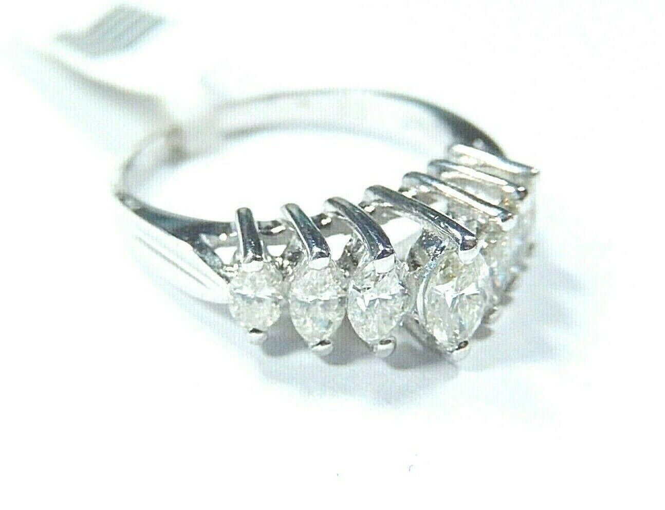 Stamped 14K  & Stamped .98 Marquise Cut 7 Graduated  Diamond Pyramid Ring