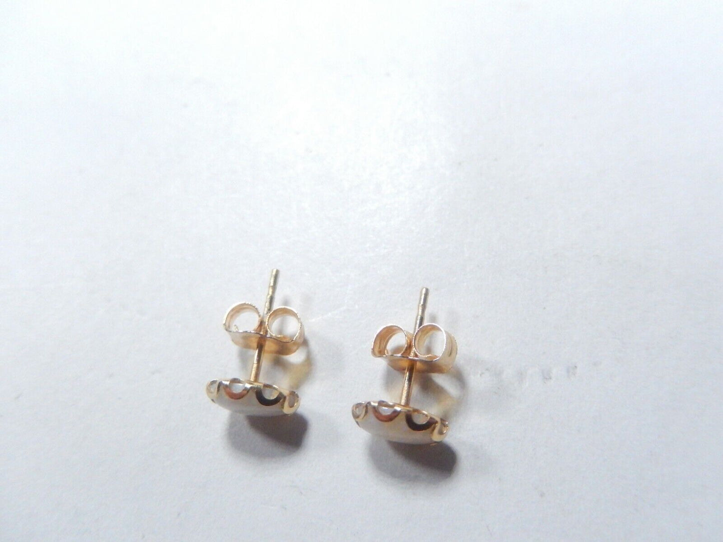 14k Yellow Gold White Color Play Opal Oval Stud Earrings 6.78mm x 4.90mm