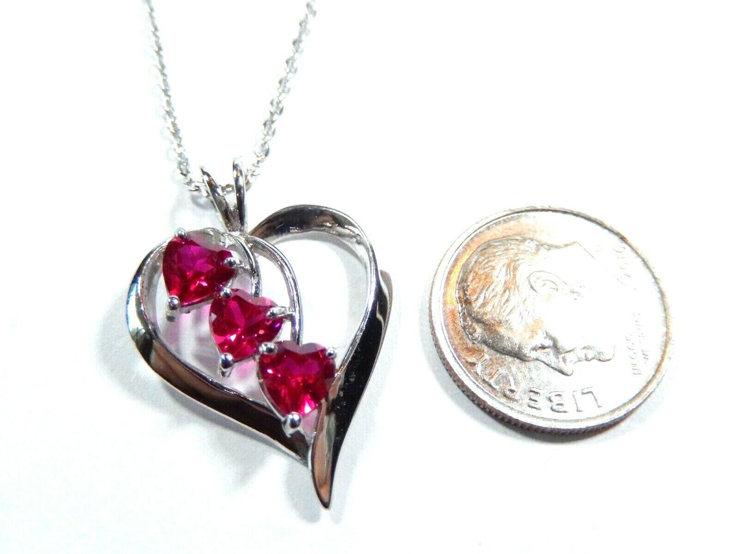 *NWT*  10K White Gold 1.00 CT Three  Ruby Heart Pendant  With 18" Chain