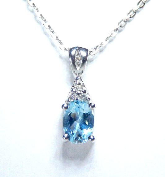10k White Gold Oval Blue Topaz And Diamond Pendant with 18" Chain