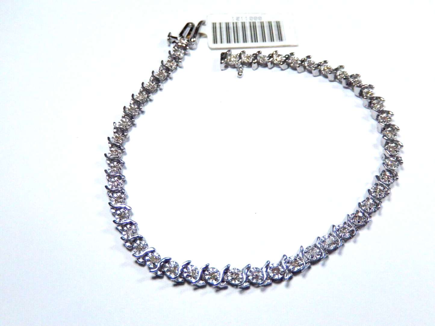 Stamped  14K White Gold "S" Link  7" Approx. 1/2CT Diamond Tennis Bracelet