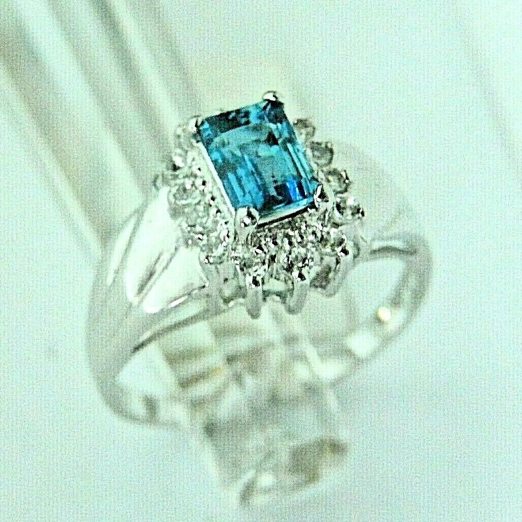 14K WHITE GOLD EMERALD CUT BLUE TOPAZ & DIAMOND HALO RING Sz 7.5