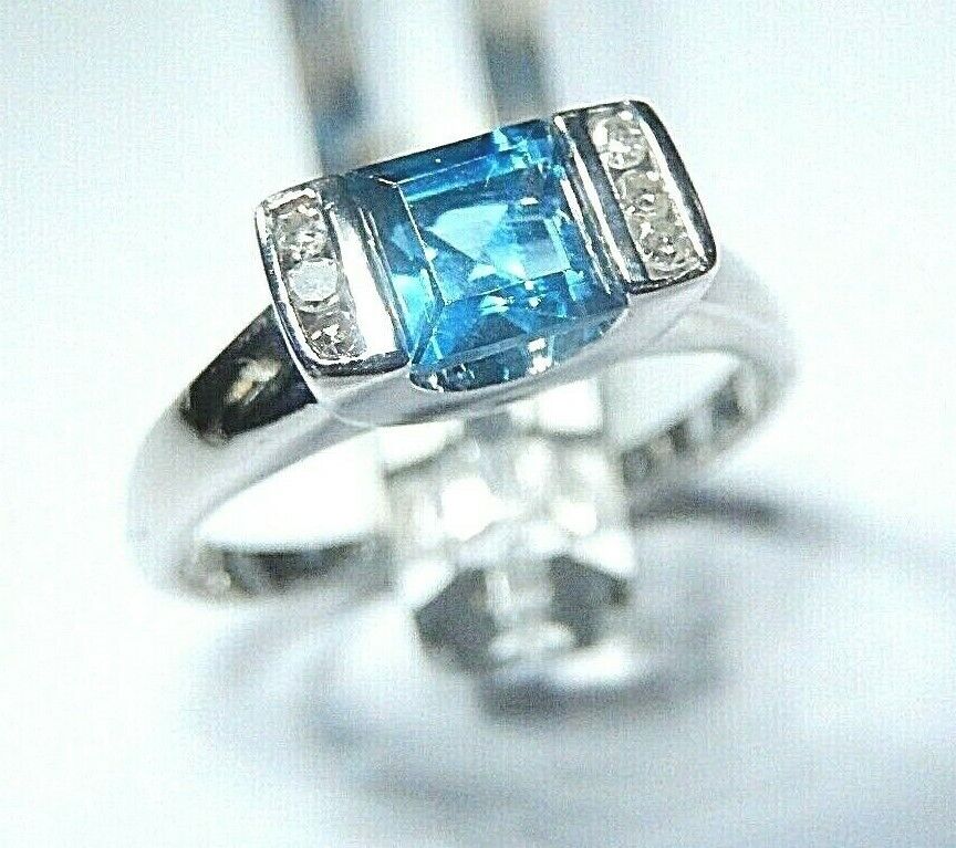 *NWT* 10K WHITE GOLD GENUINE BLUE TOPAZ AND DIAMONDS LADIES COCKTAIL RING Sz 9.5