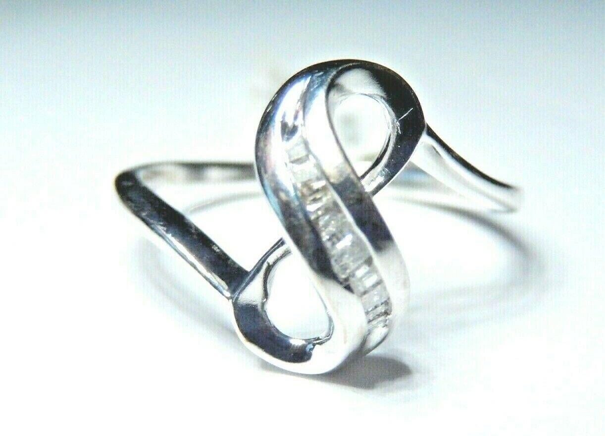 *NWT* 10k White Gold Women's Round Diamond Infinity Ring Size 7.5