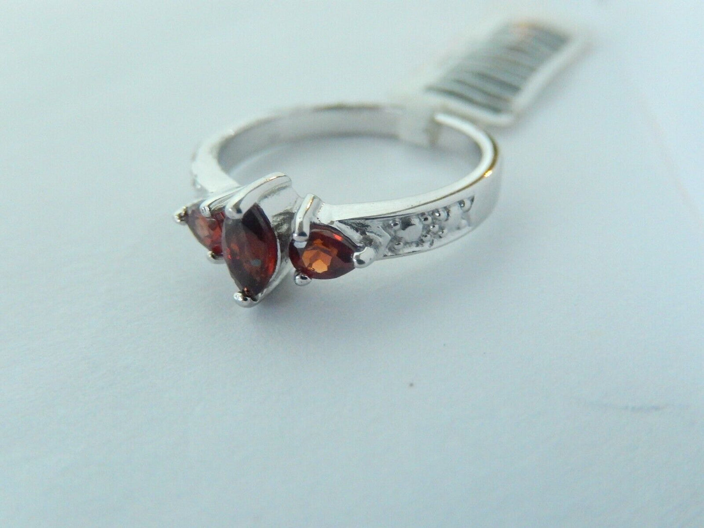 10K White Gold Three-Stone Garnet Ring Size 7.5