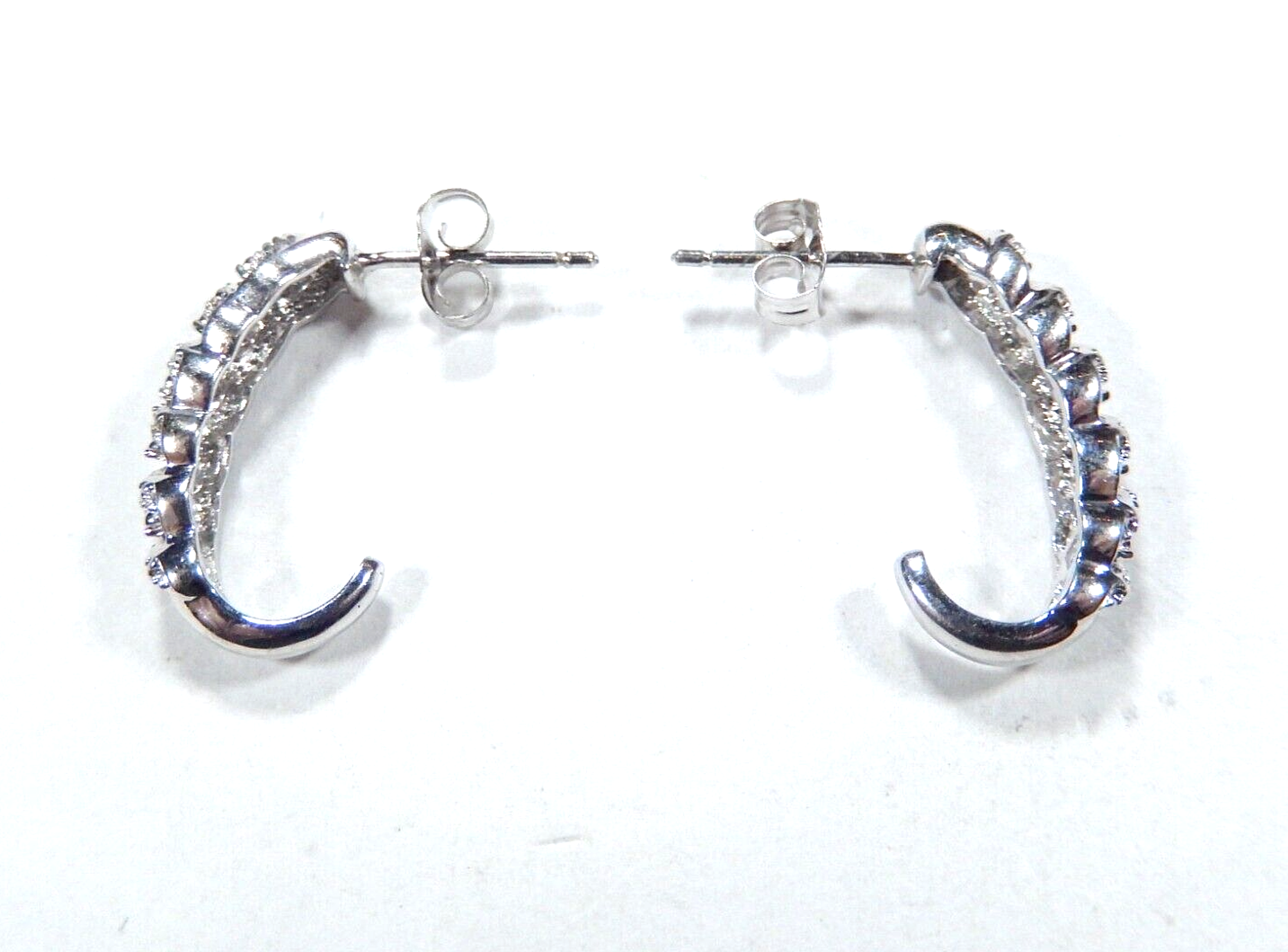 Sterling Silver .25ctw Genuine Natural Diamond J-Hoop Earrings.